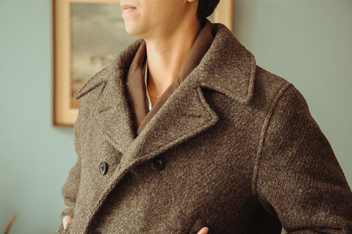 Detail Shot of a Margaret Howell Styled Look Featuring the Striped Collared Shirt and Pants