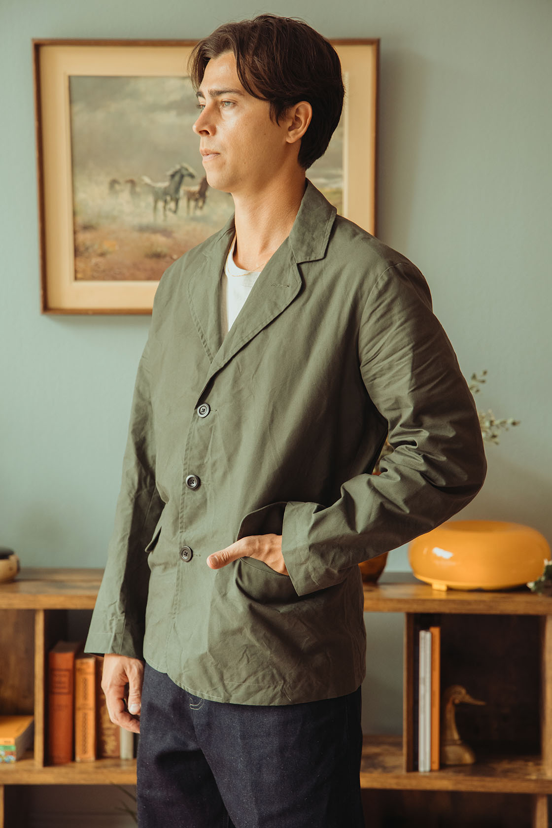 Image of model wearing Conkers Rambler Blazer in Seafoam with hand in pocket