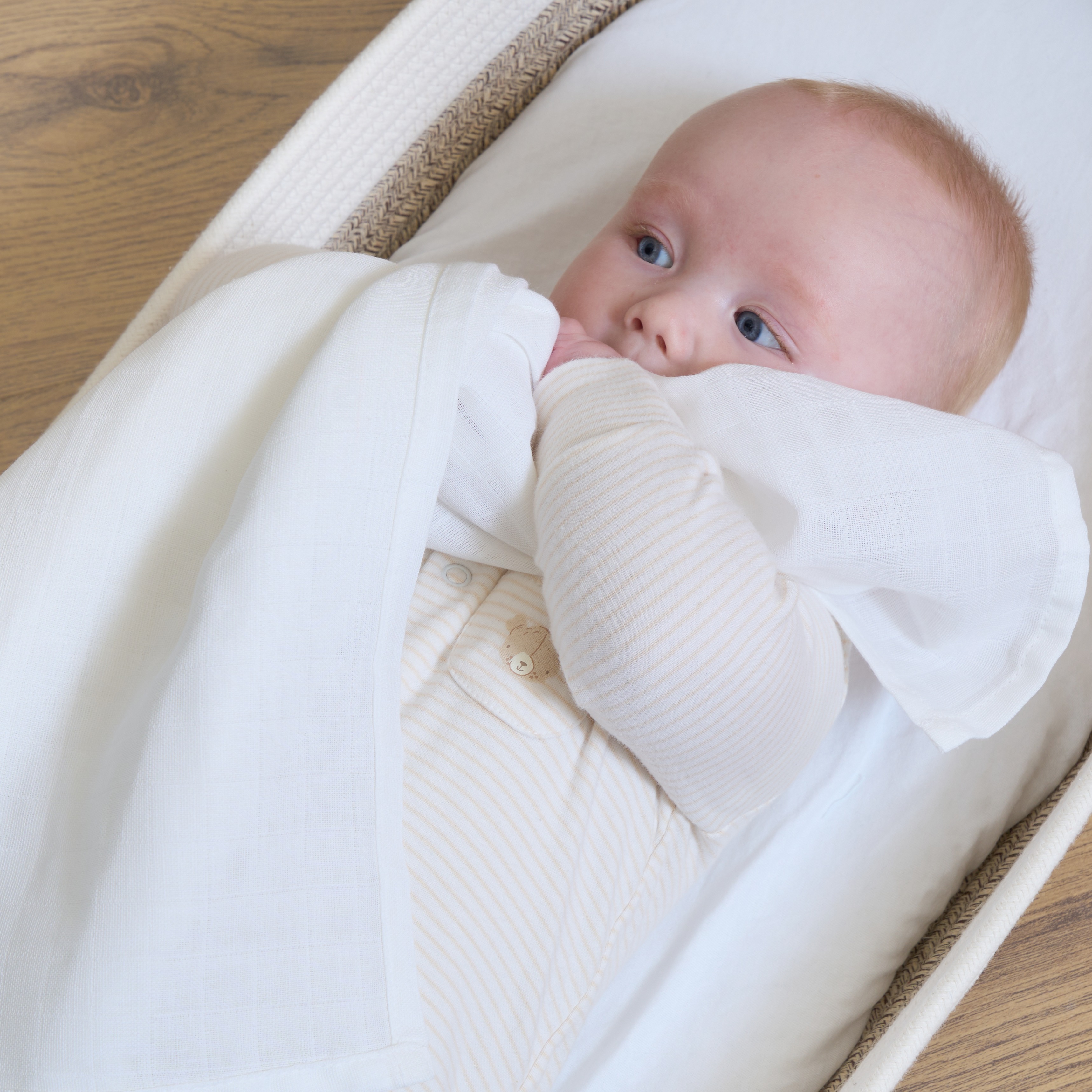 Clair de Lune Baby Holding White Muslin Square