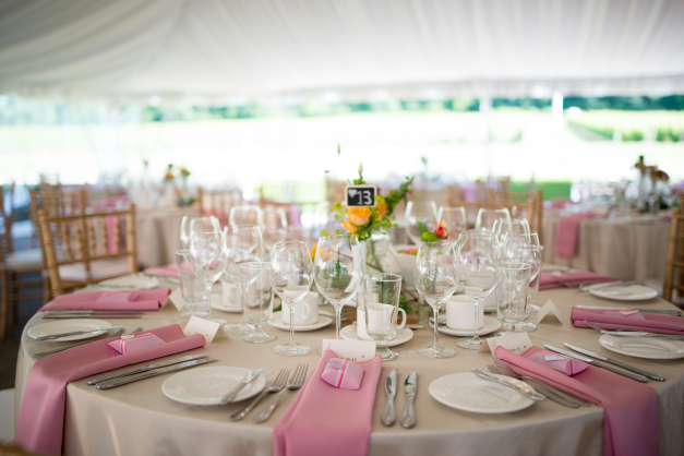 pink wedding reception round table setup