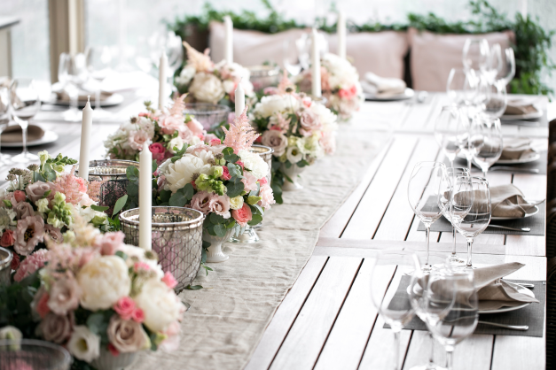 Pink and green wedding reception rectangle table setup