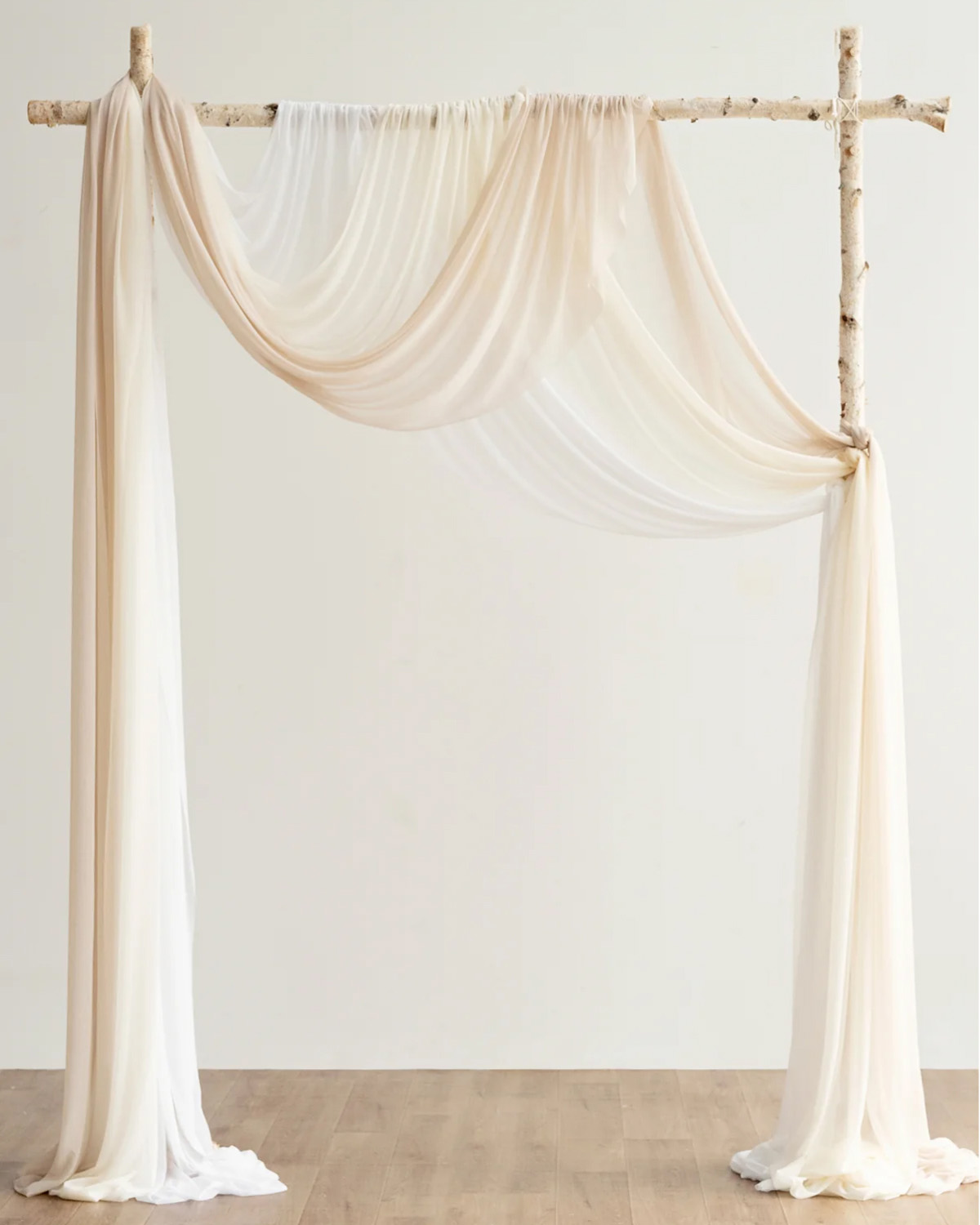 Shades of Cream Sheer Arch Drapes