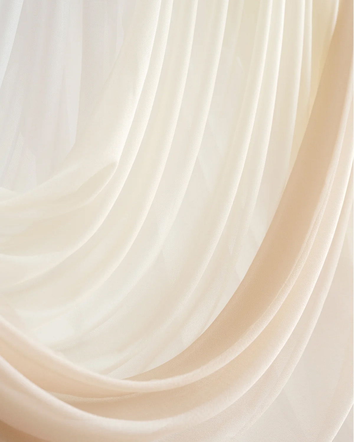 Shades of Cream Sheer Arch Drapes