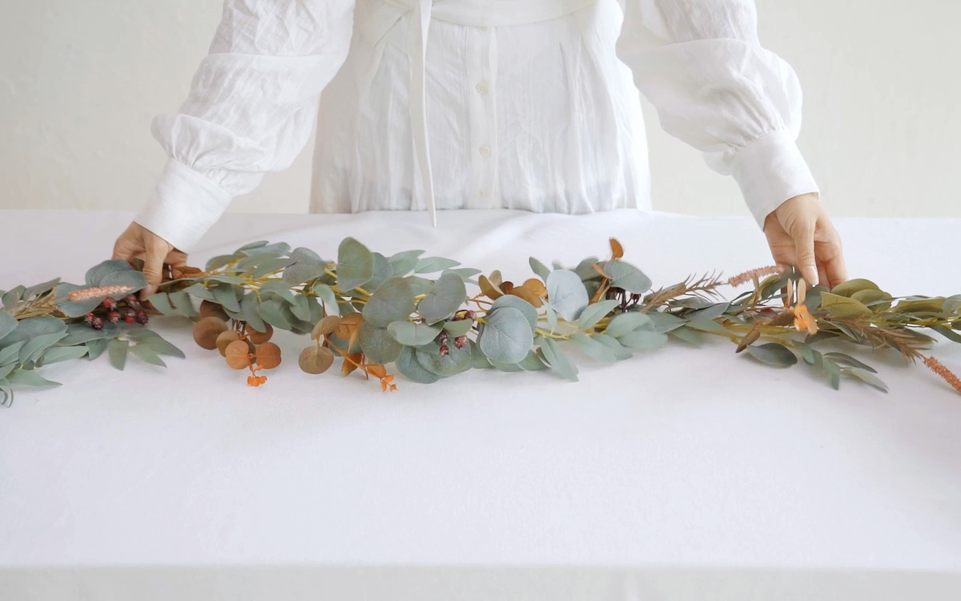 6ft Eucalyptus and Willow Leaf Garland with Filler Flowers in Sunset Terracotta