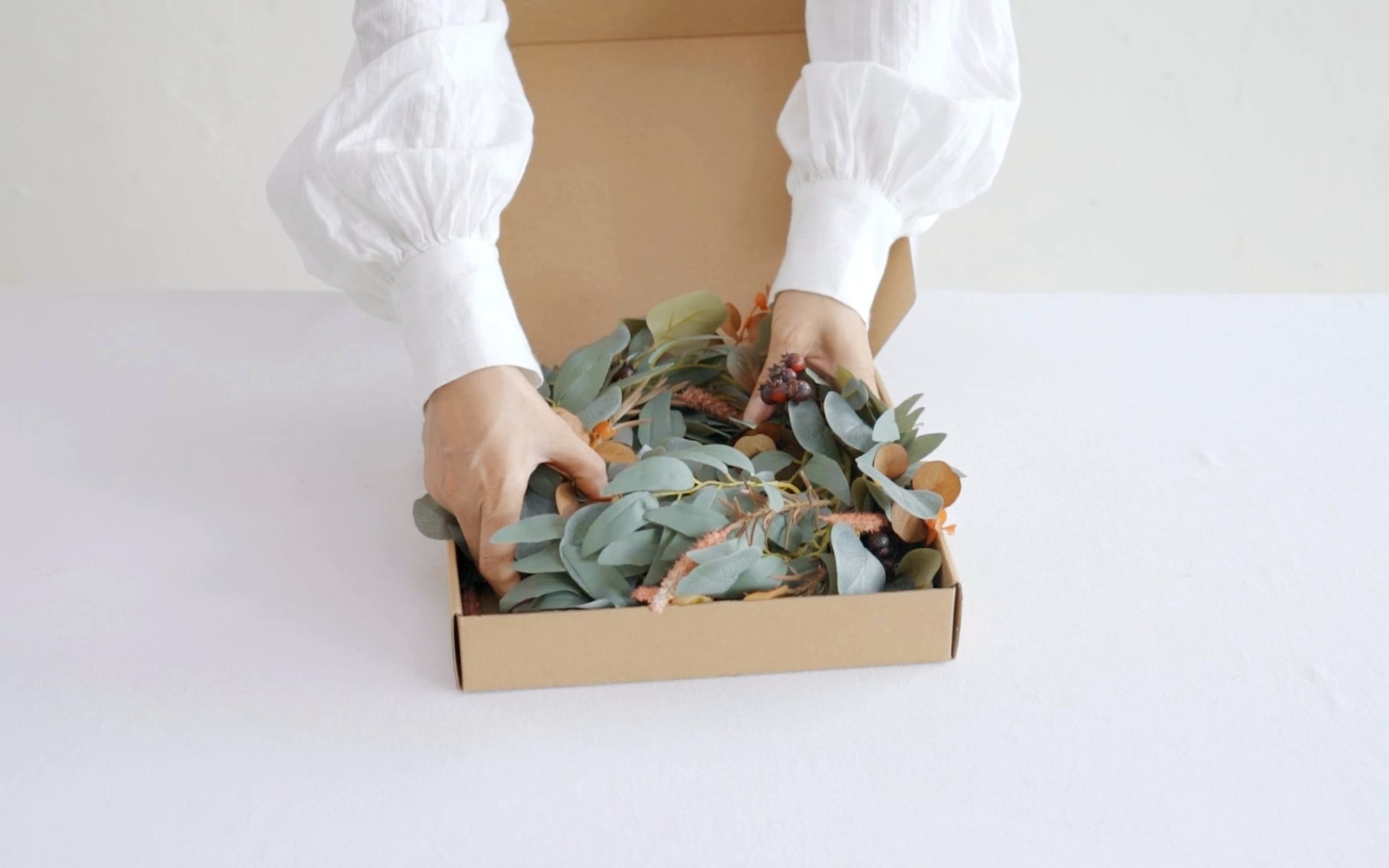 6ft Eucalyptus and Willow Leaf Garland with Filler Flowers in Sunset Terracotta