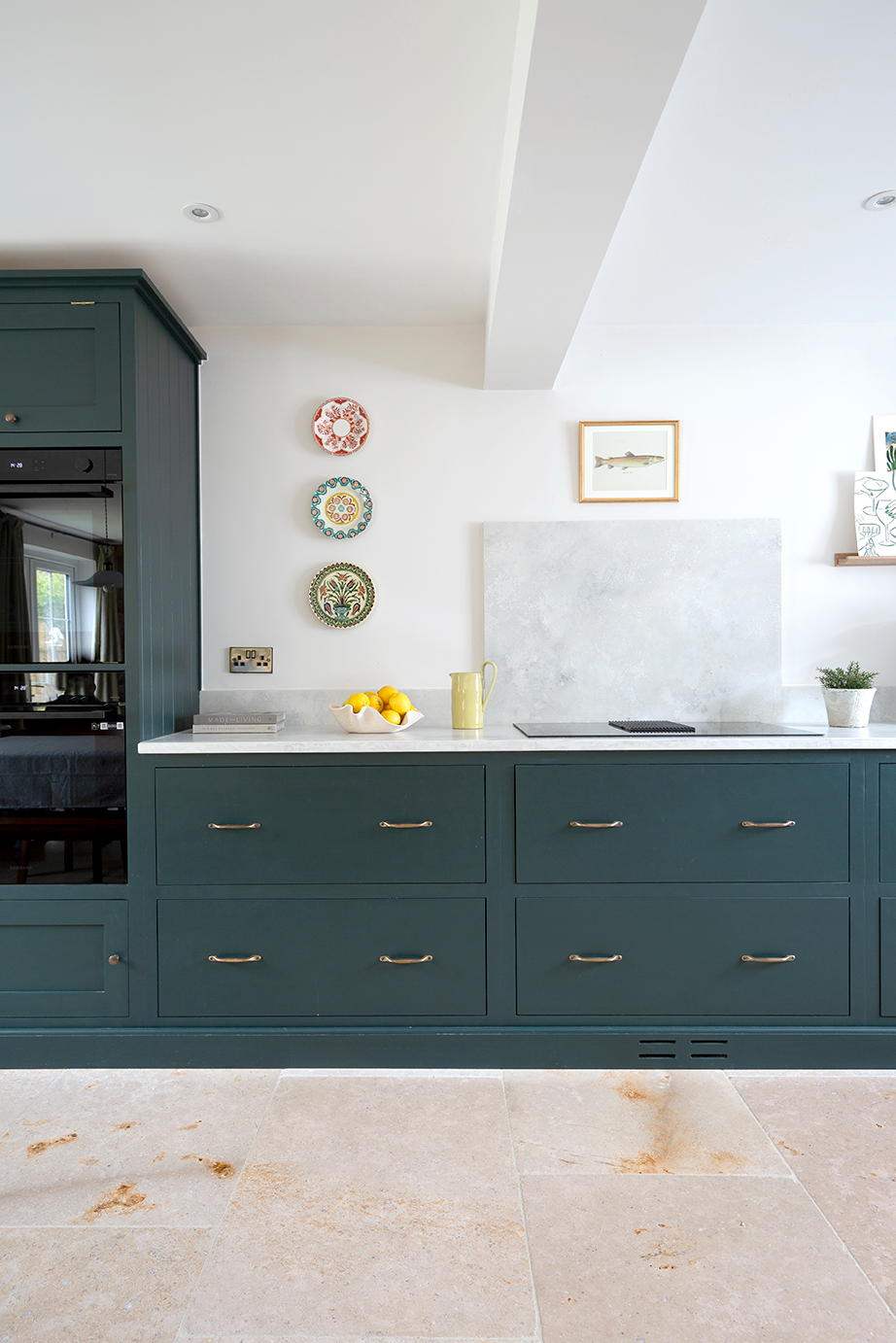 Dijon Blend Tumbled Limestone Tiles in Dark Green Kitchen