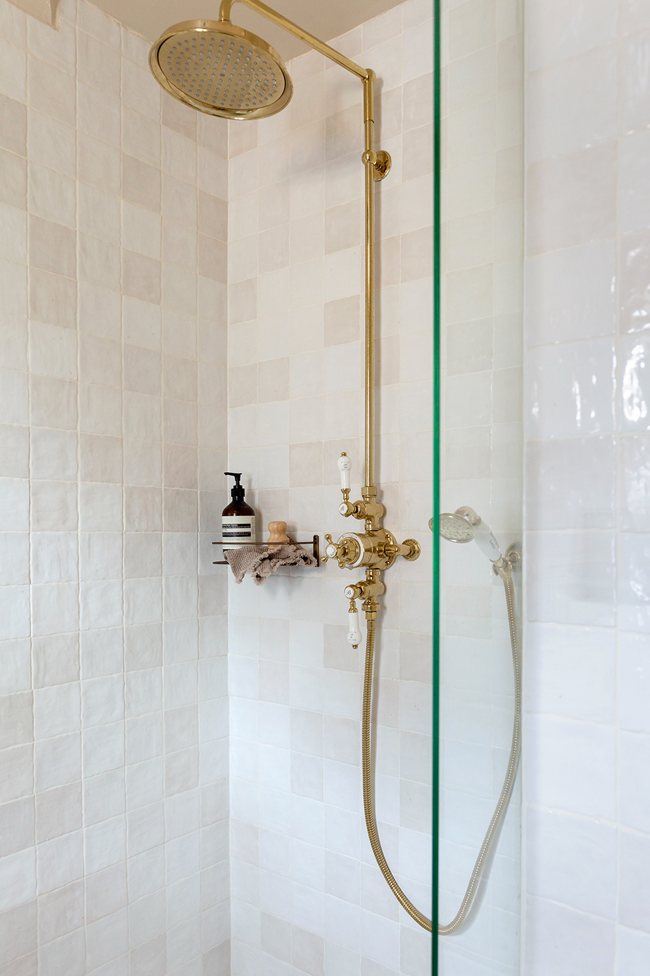 gloss white zellige tiles in shower area