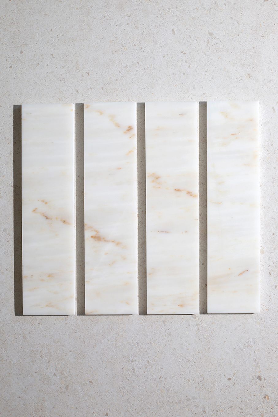 Carrara Oro Honed Marble metro close up 