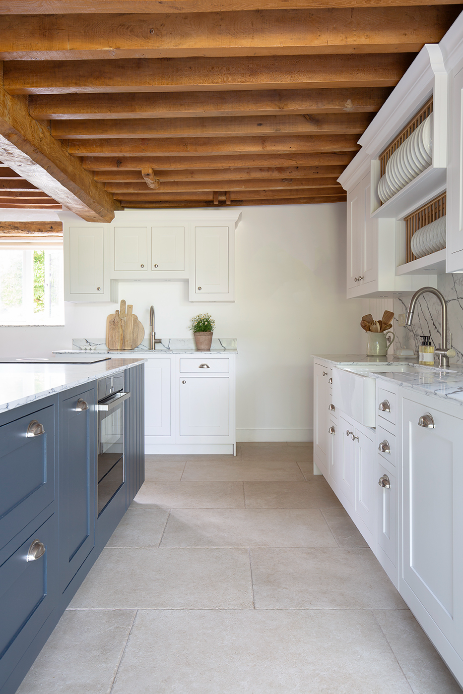Hambleton Beige floor tiles with blue and white cabinets
