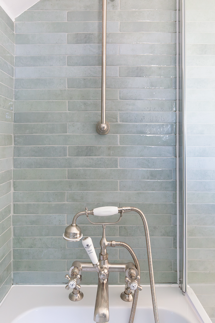 Luella Powder Blue elongated metro tiles in a shower space