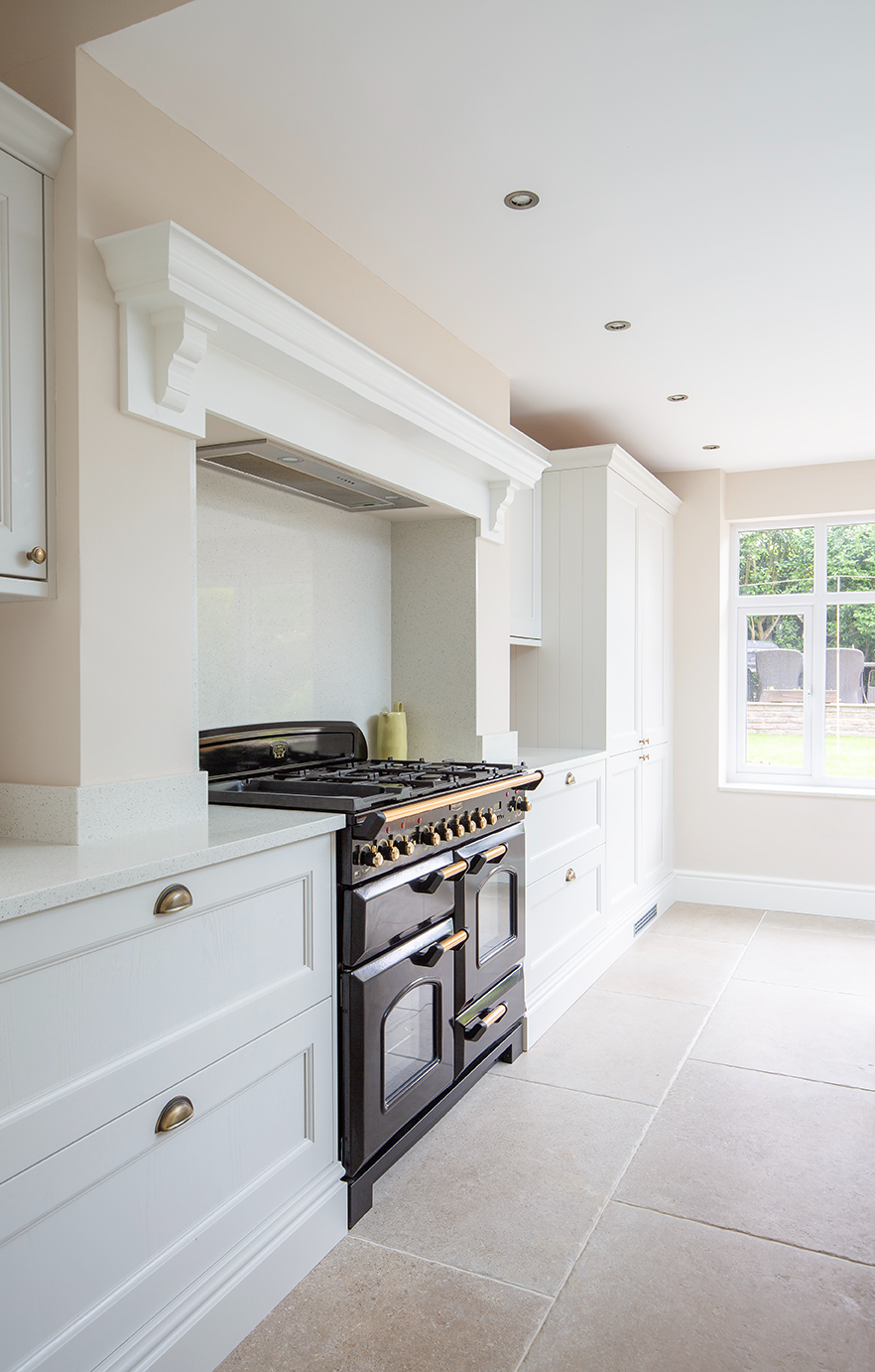 Montpellier Sable tiles in a kitchen with cream cabinets