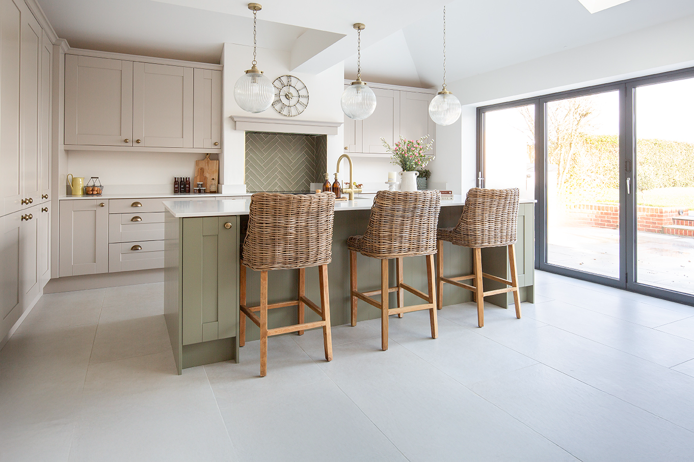 Frome White tiles in an open plan kitchen with island and stools 