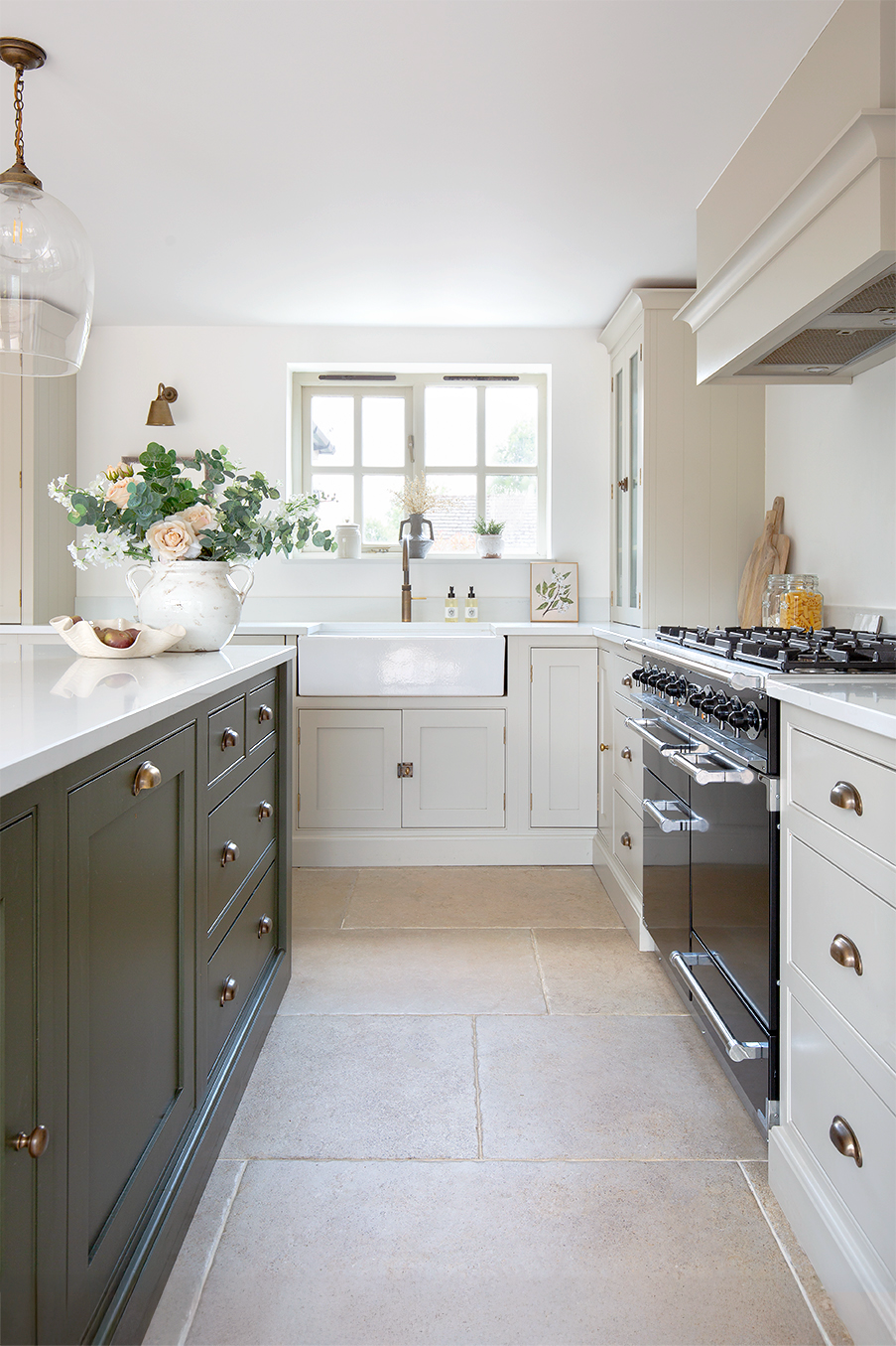Montpellier Sable floor tiles with green and white cabinets