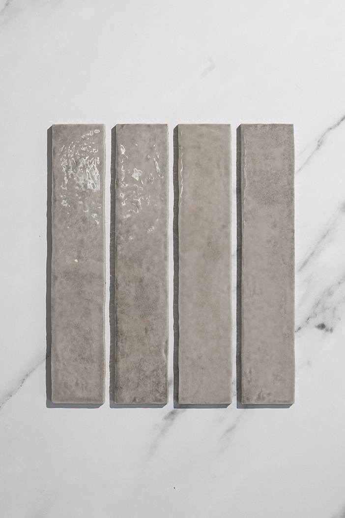 a flatlay of pigment stone grey tiles close up