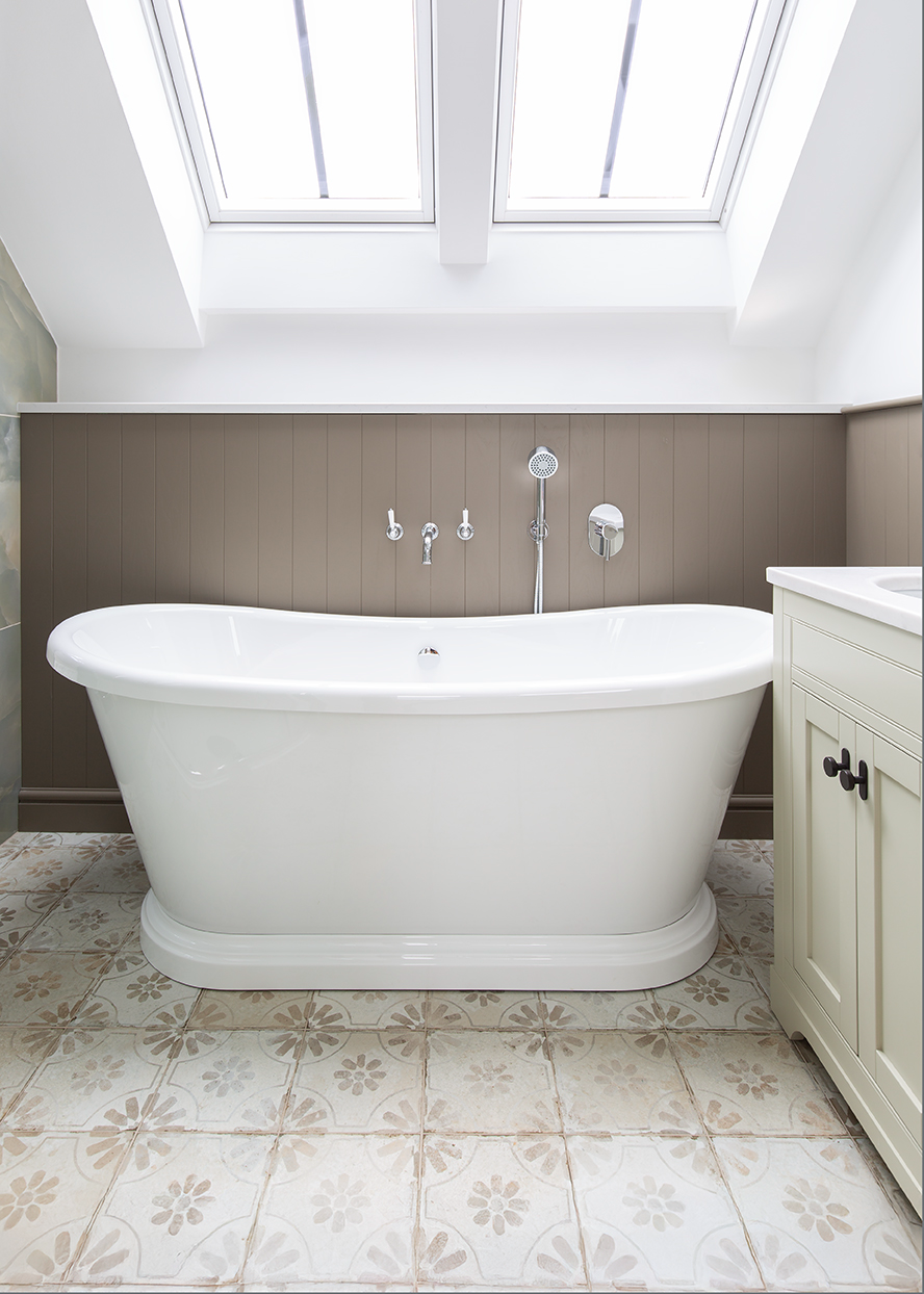 Penrose White floor tiles with a white bath and white vanity 
