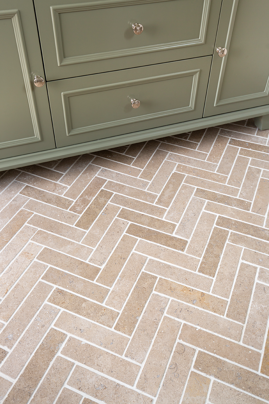 Dijon Tumbled Herringbone Bathroom Tiles Closeup