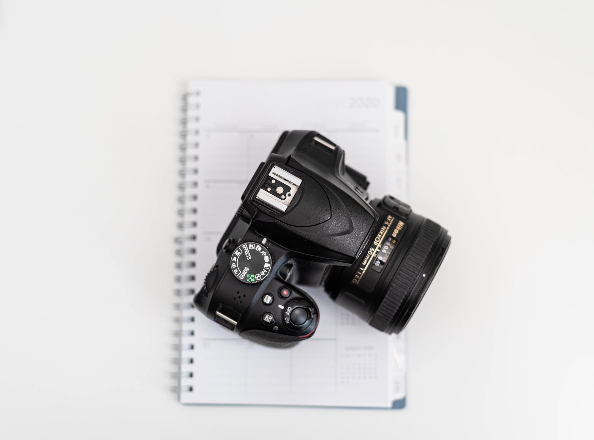 camera, notebook, when should you start charging your clients